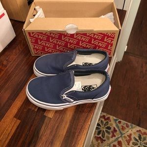 Little boys slide on Vans